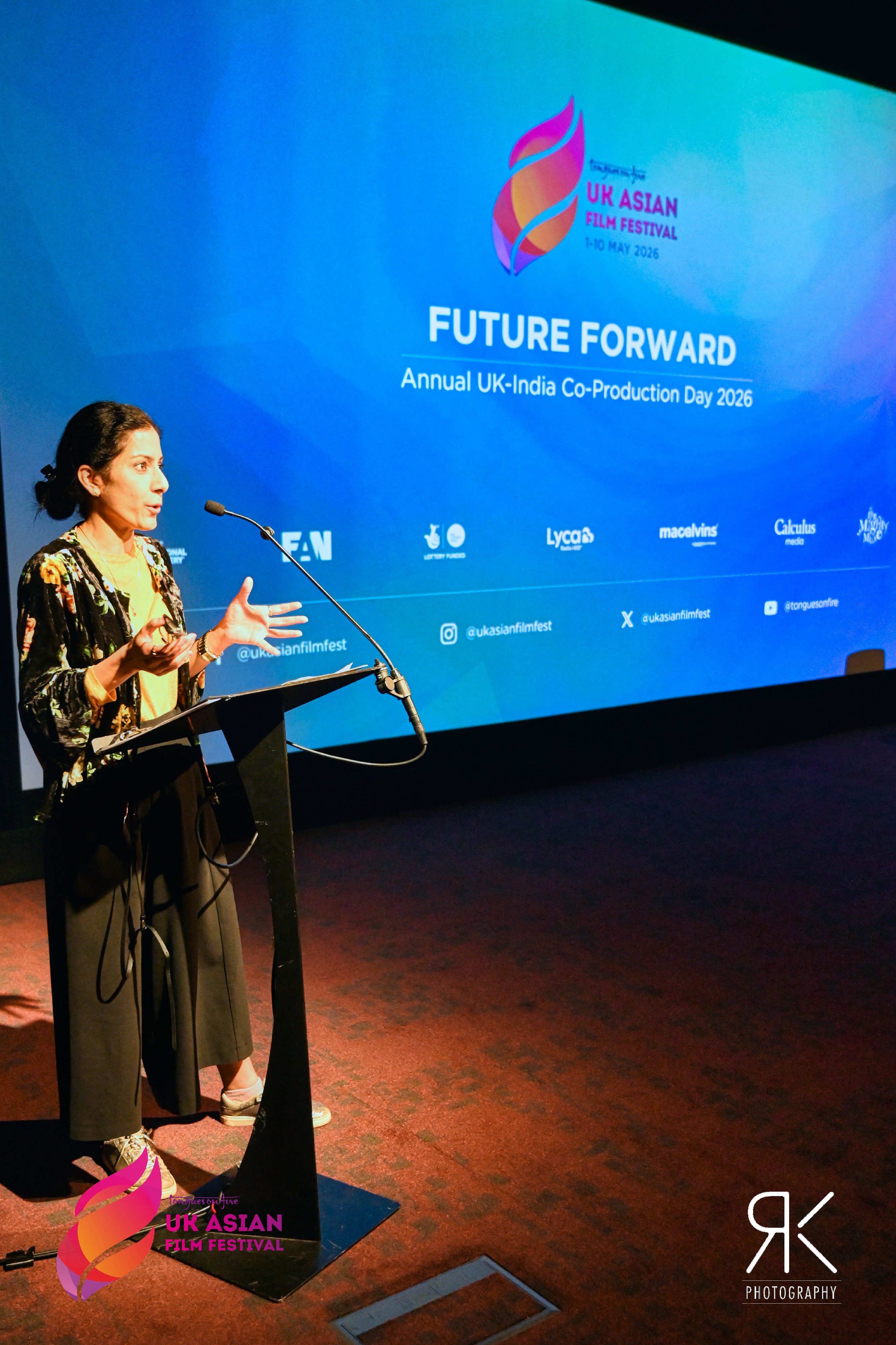 Amit Kaur speaking at the podium at Future Forward, the Annual UK-India Co-Production Day